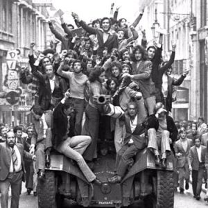 Carnation Revolution people on one of the tanks that occupied the city to liberate the country